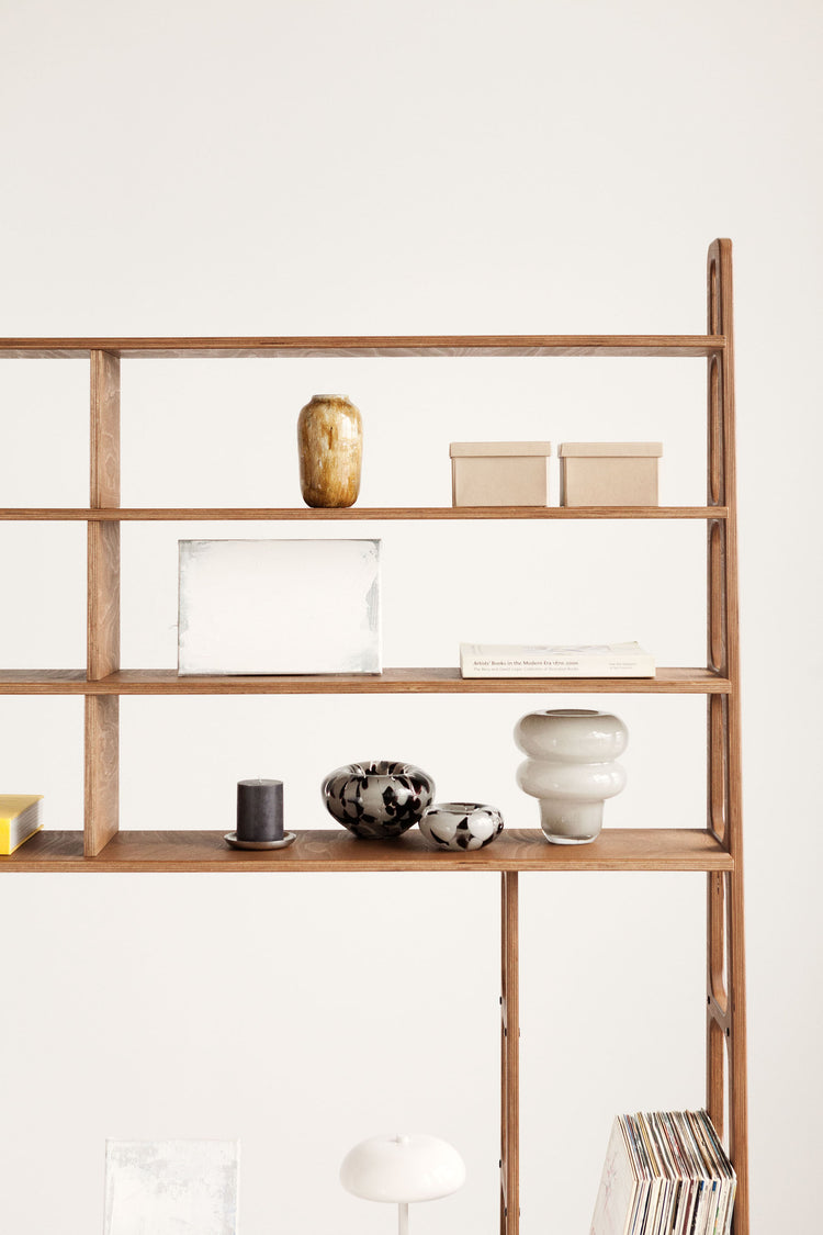 detail-of-mid-century-bookcase-with-cabinet-and-drawers-walnut-stain-in-living-room