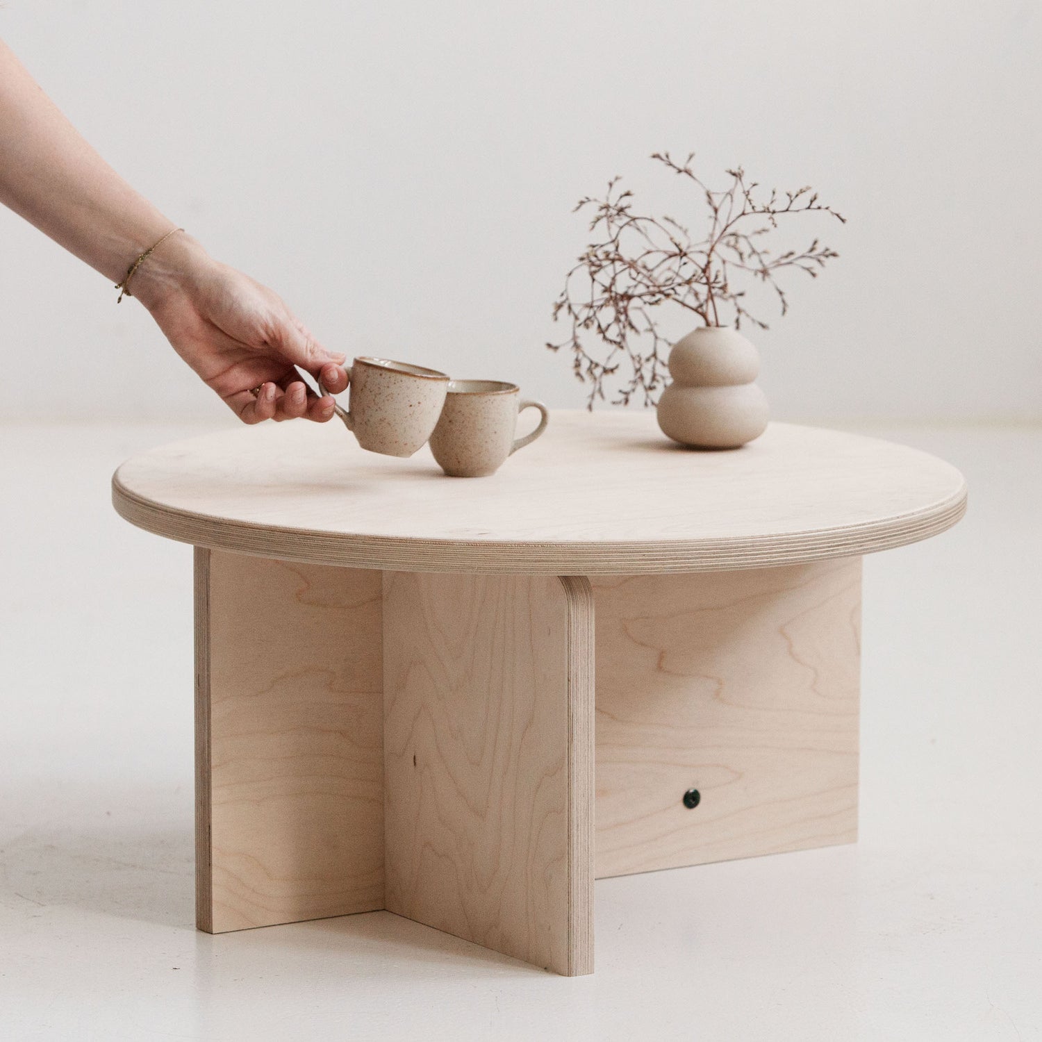 Japandi round coffee table handmade in Europe from birch plywood with natural oil-wax finish