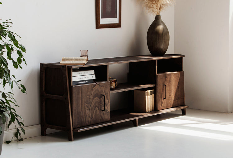 Mid-century TV stand and media console with two cupboards and open shelves in dark wood finish