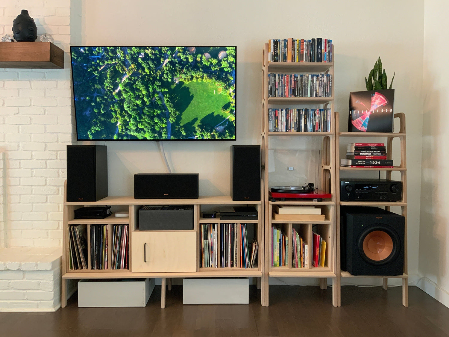 Plywood audio furniture set in a modern living room with vinyls and speakers