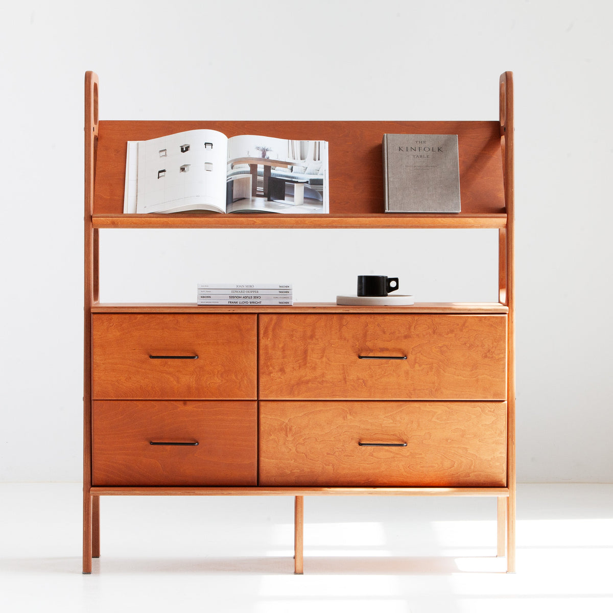 Mid-century plywood magazine display bookcase with angled display shelf and four drawers