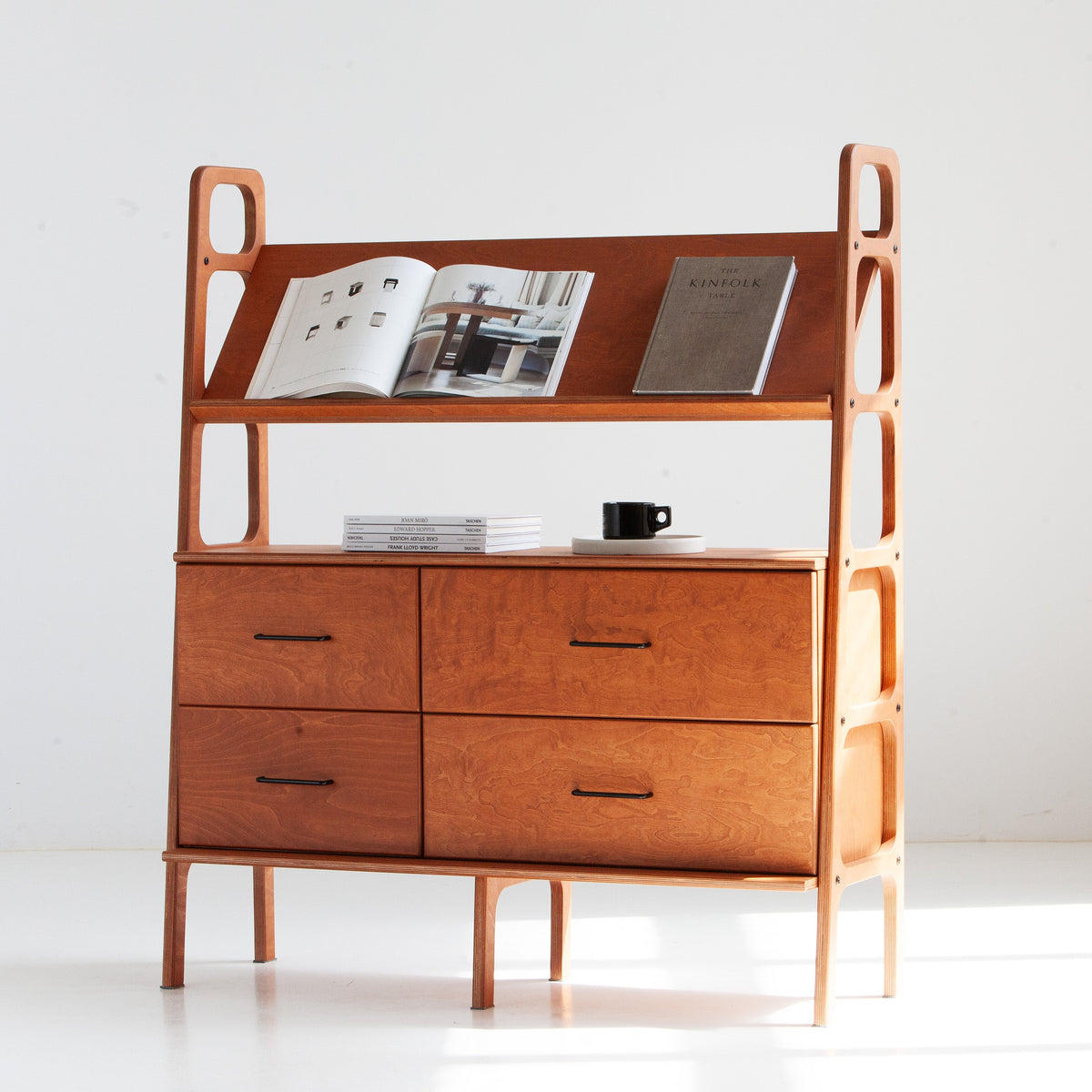 Mid-century plywood magazine display bookcase with angled display shelf and four drawers
