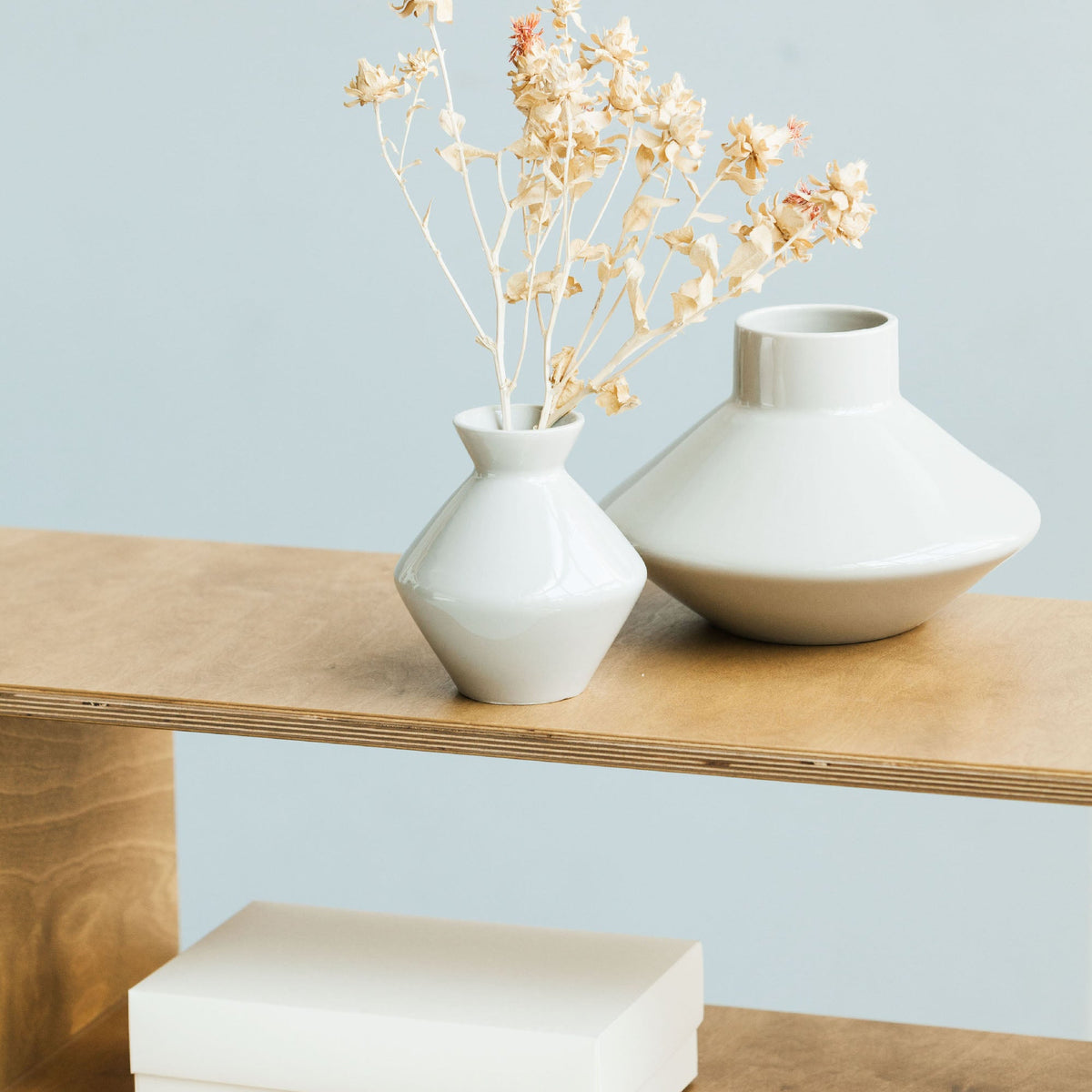 closeup-on-details-vase-on-wooden-mid-century-modern-bookcase