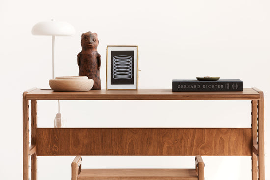 desktop-of-wooden-growing-desk-for-kids-in-full-sun