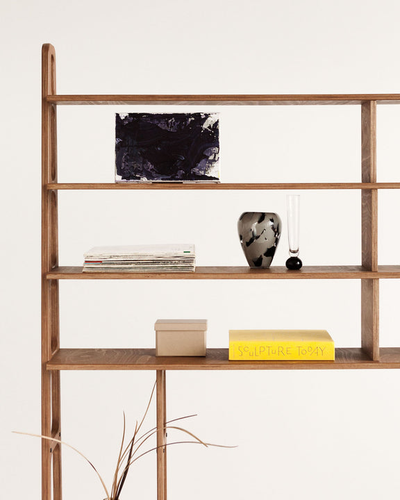 detail-of-mid-century-bookcase-with-cabinet-and-drawers-walnut-stain-in-living-room