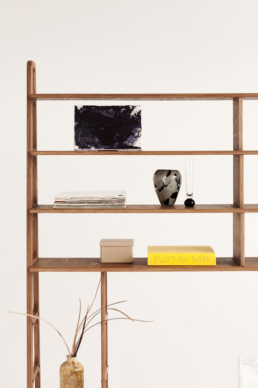 detail-of-mid-century-bookcase-with-cabinet-and-drawers-walnut-stain-in-living-room