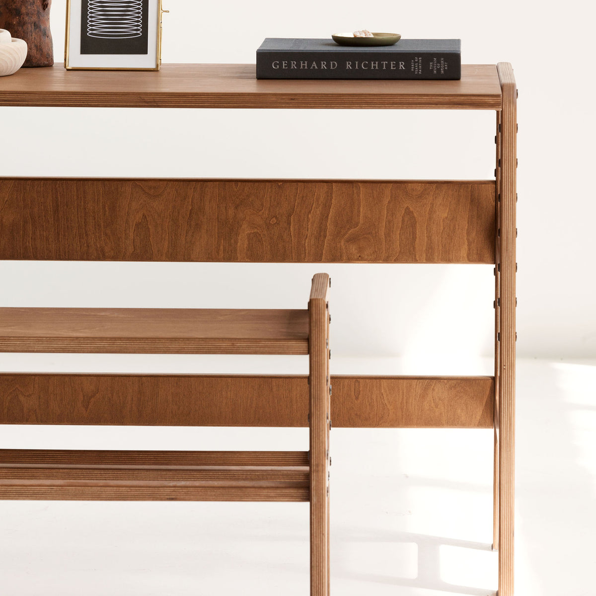 detail-of-wooden-growing-desk-for-kids-in-full-sun
