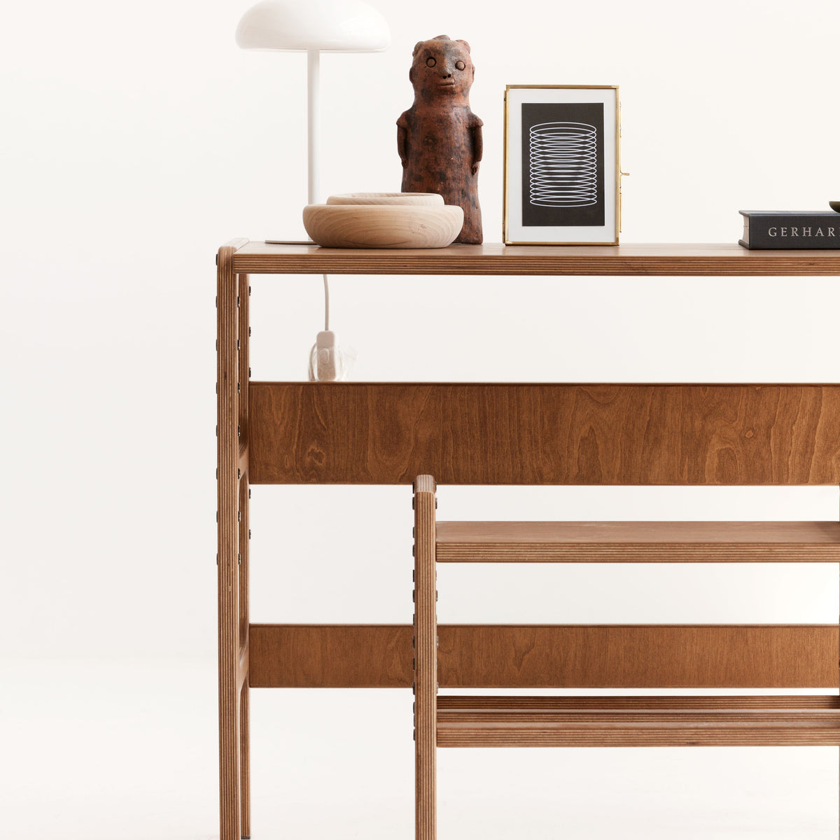 detail-of-wooden-growing-desk-for-kids-in-full-sun