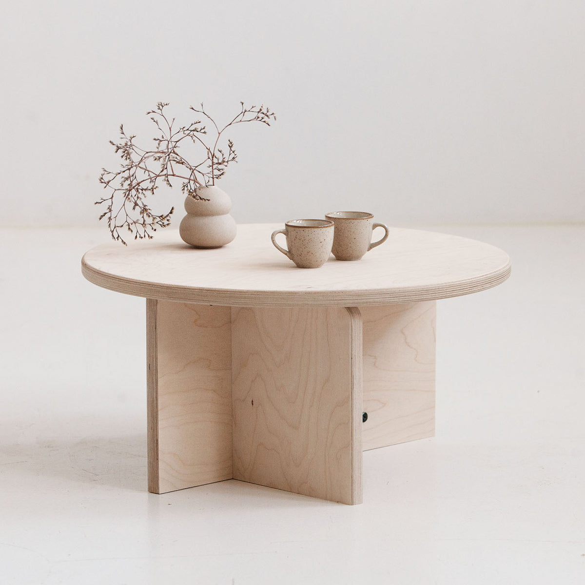 japandi round coffee table Europe in walnut, teak or natural birch finish