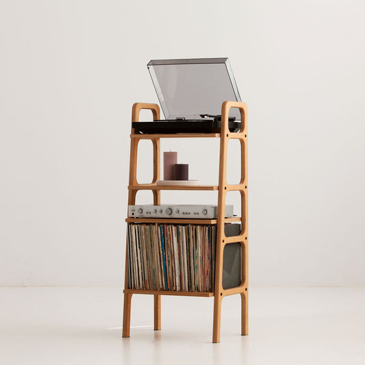 Front view of a slim mid-century vinyl storage tower with turntable shelf, amplifier shelf and LP compartment, wooden bookshelf