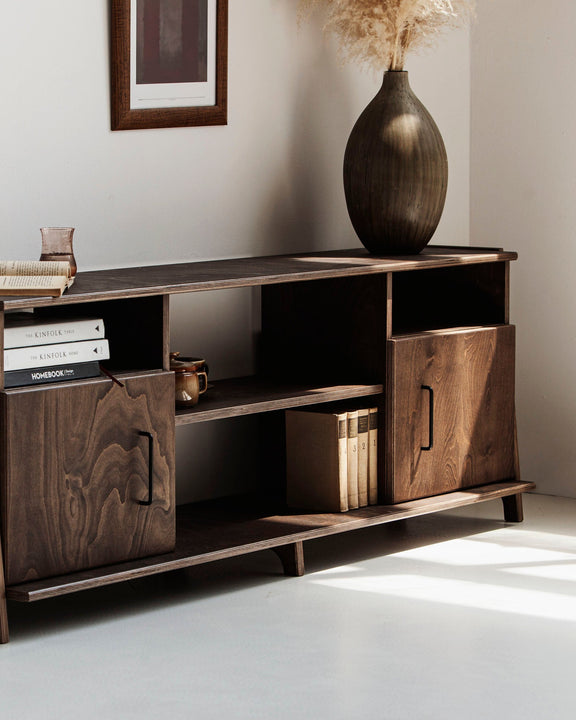 Mid-century TV stand and media console with two cupboards and open shelves in dark wood finish