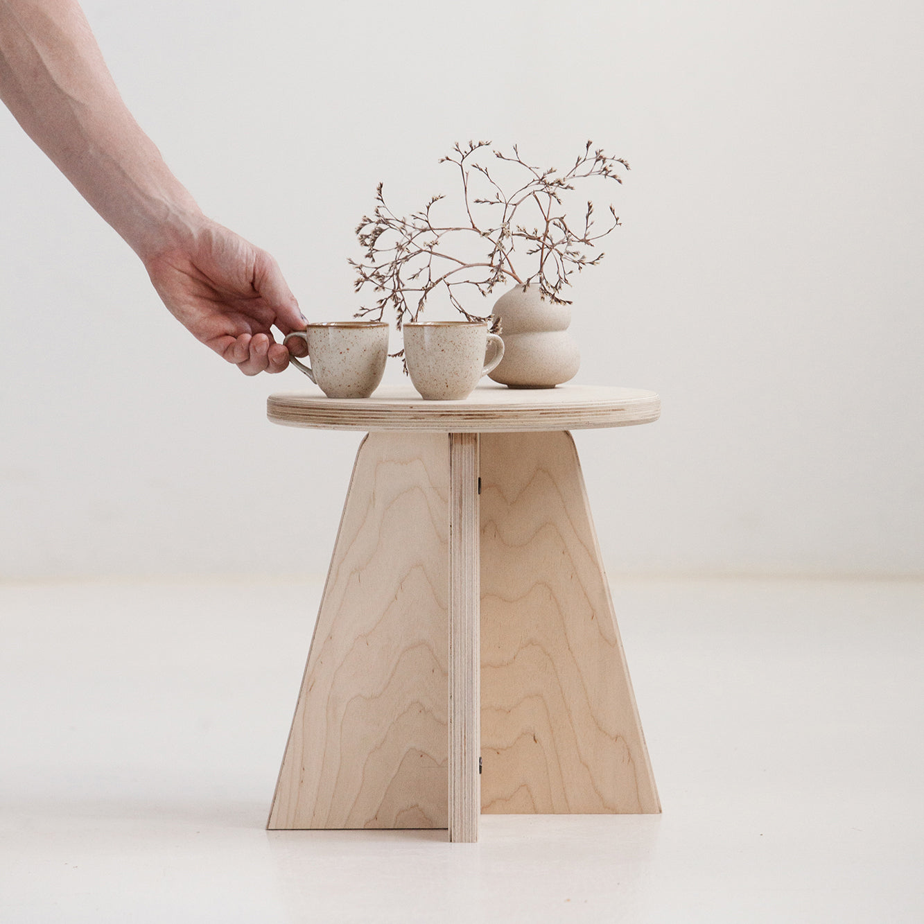 Small Japandi side table handmade in Europe from birch plywood with natural oil-wax finish