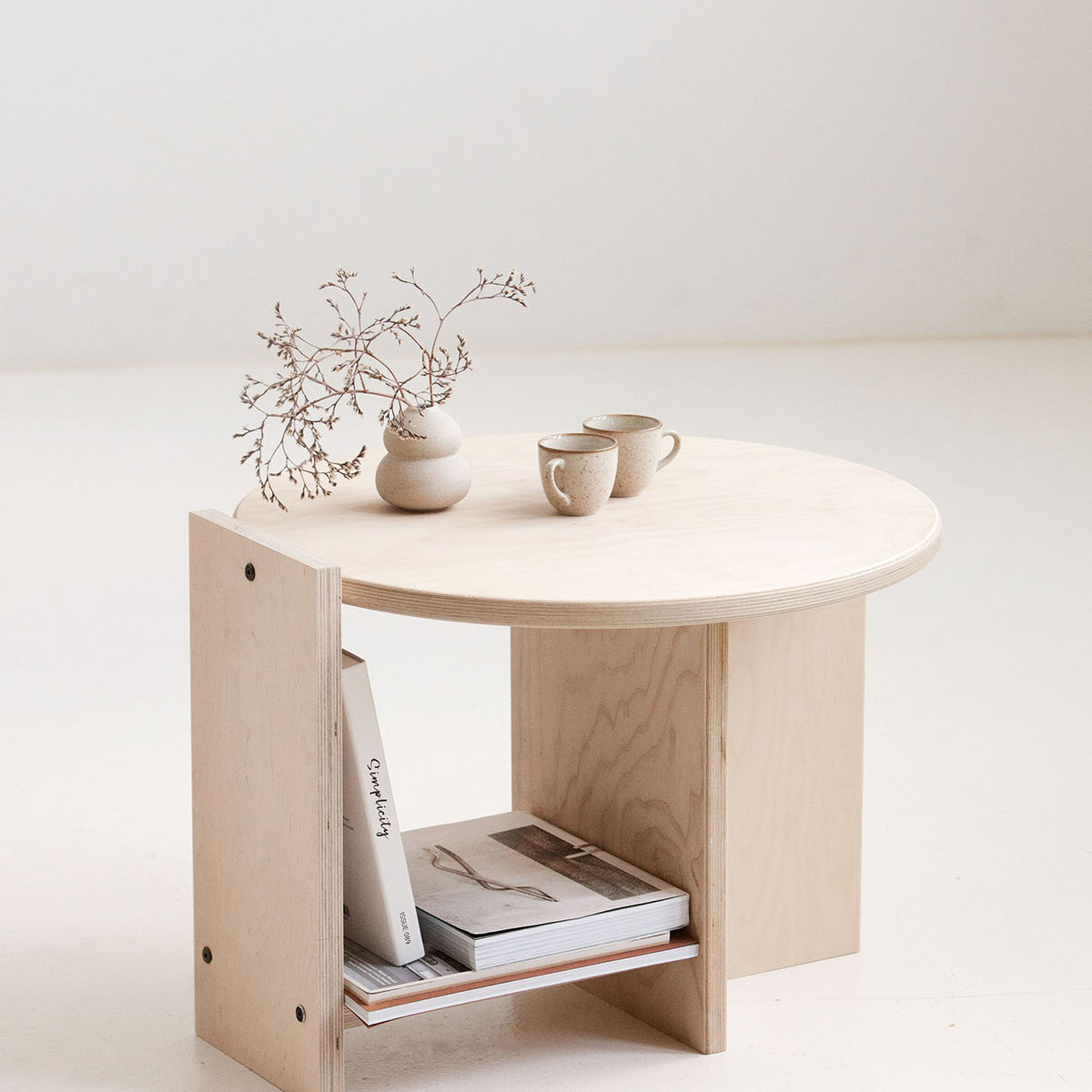 Handcrafted plywood coffee table Europe with functional storage shelf