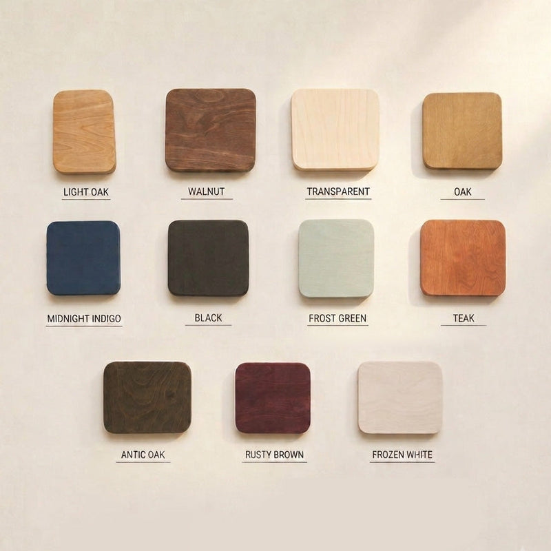 Eleven hand-oiled birch plywood finish samples: light oak, walnut, transparent, oak, midnight indigo, black, frost green, teak, antic oak, rusty brown and frozen white