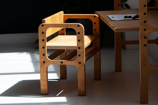 wooden-growin-chair-for-kids-in-sun