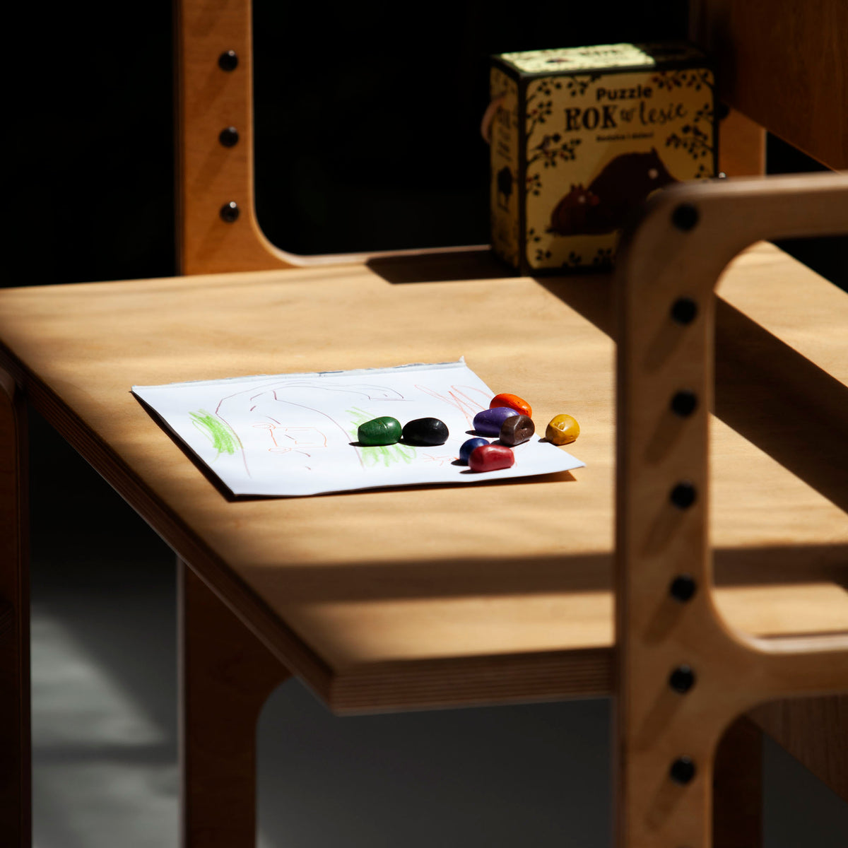 wooden-growing-desk-for-kids-in-full-sun