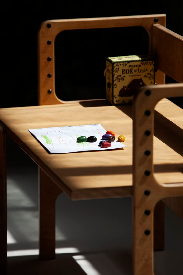 wooden-growing-desk-for-kids-in-full-sun